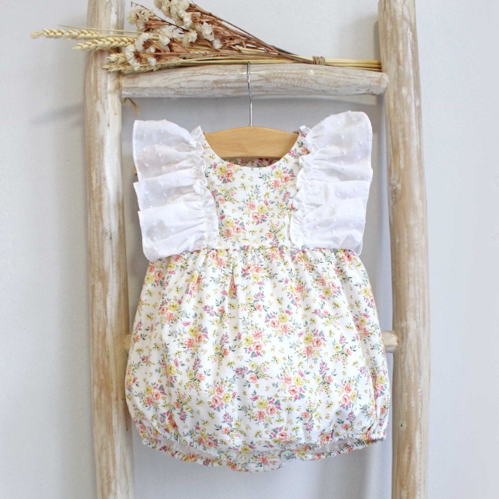 Floral Romper with plumeti frill