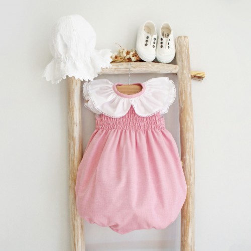 Pink romper with frilly collar