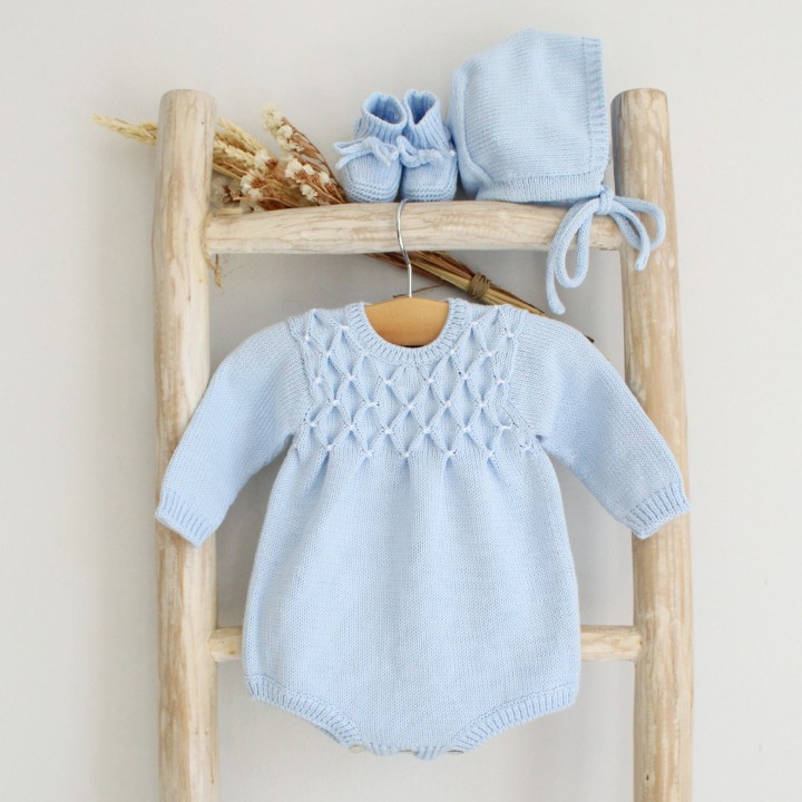 Cotton knitted romper with smocks