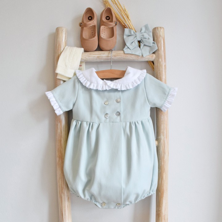 Short sleeved romper with frilly details 