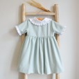 Short sleeved dress with frilly details 