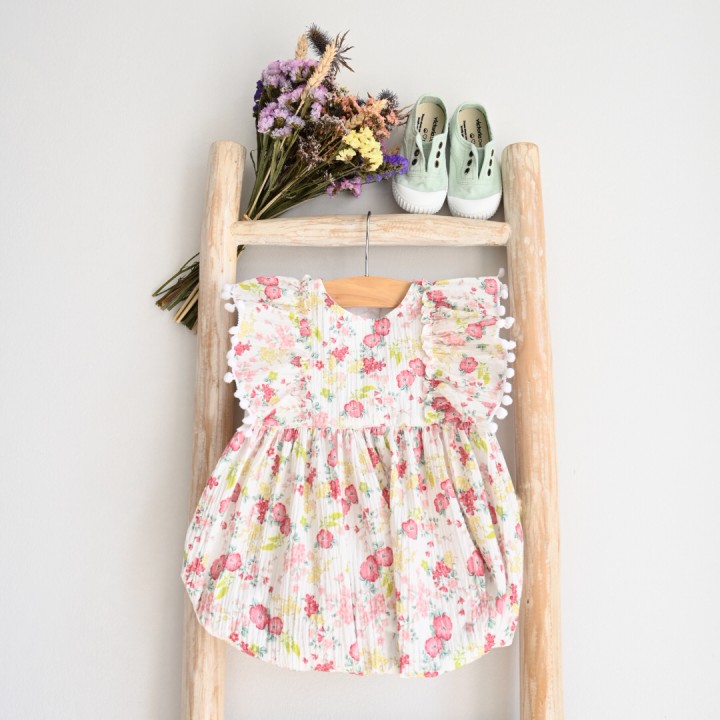 Floral  romper with Pom Pom