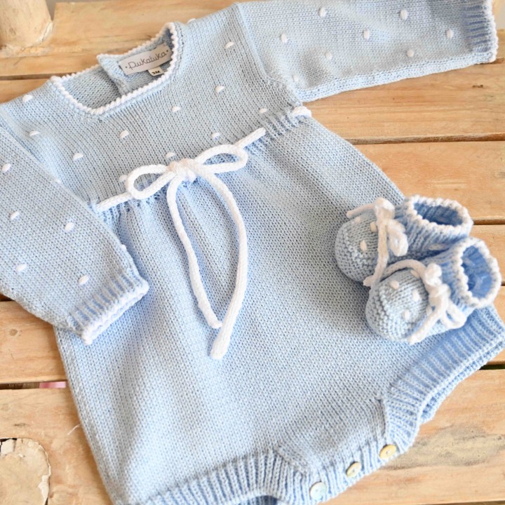 Blue cotton knitted romper with dots and bow